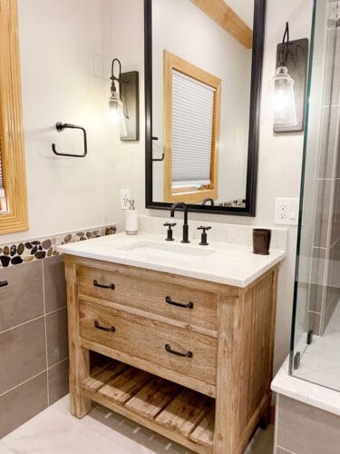 bathroom remodel with rustic freestanding vanity