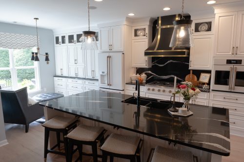 Kitchen Remodel in Mt Juliet with white cabinets and black countertops