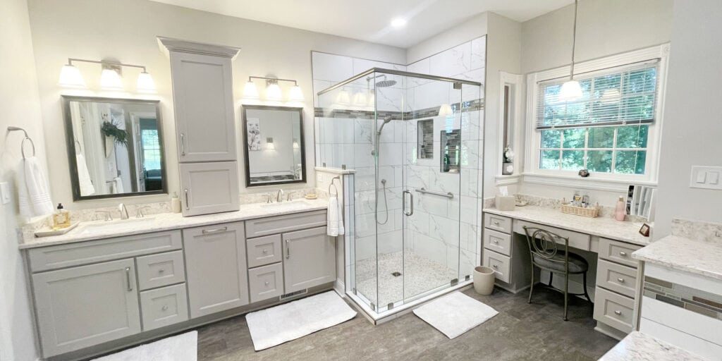 bathroom remodel with dressing table and double vanity