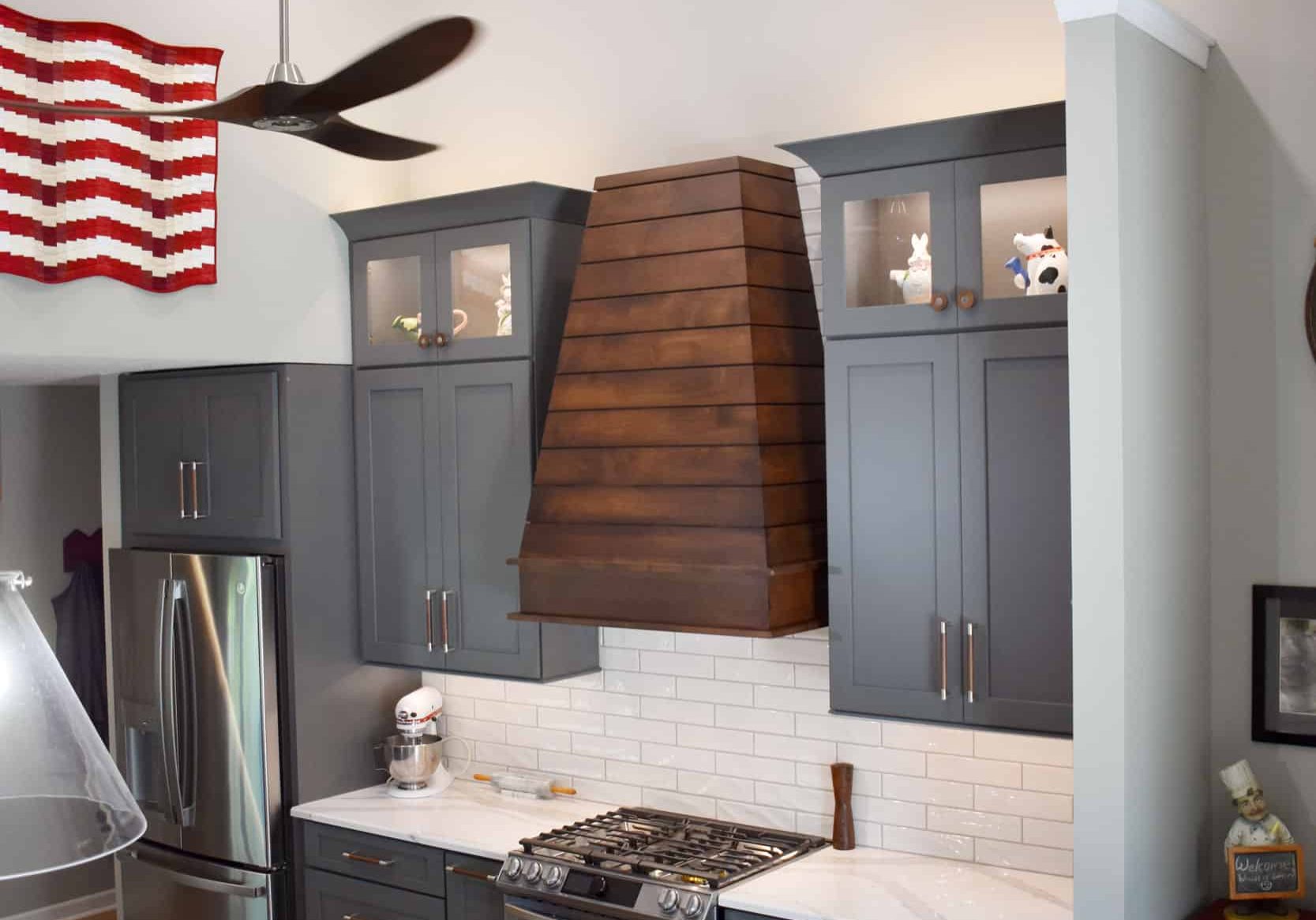 gallatin kitchen remodel with gray cabinets and shiplap range hood 4436