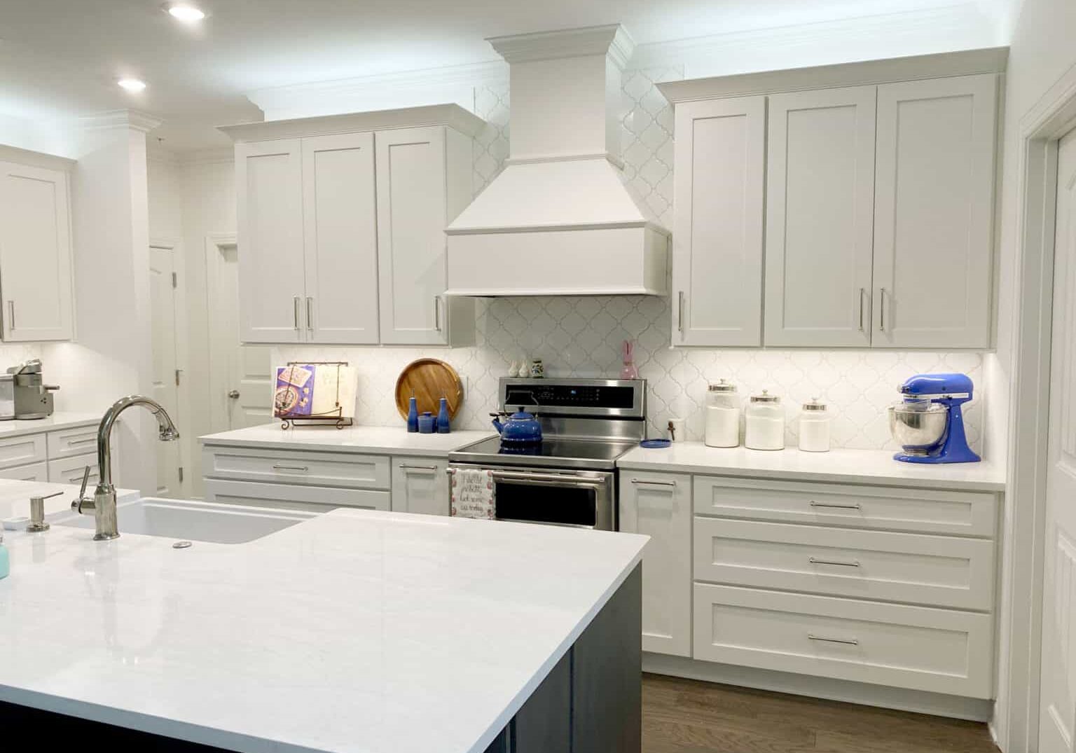 gallatin kitchen remodel with wood range hood and arabesque backsplash tile 4440