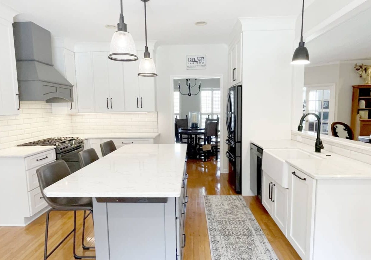 gladeville kitchen remodel white cabinets with contrasting gray island and range hood