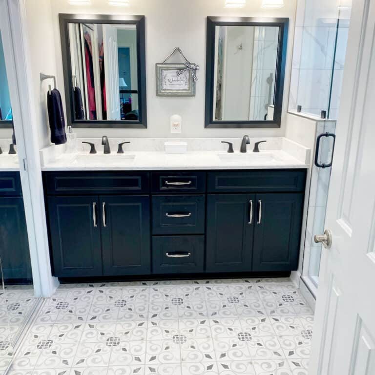 old hickory bathroom remodel with black cabinets and patterned tile floor