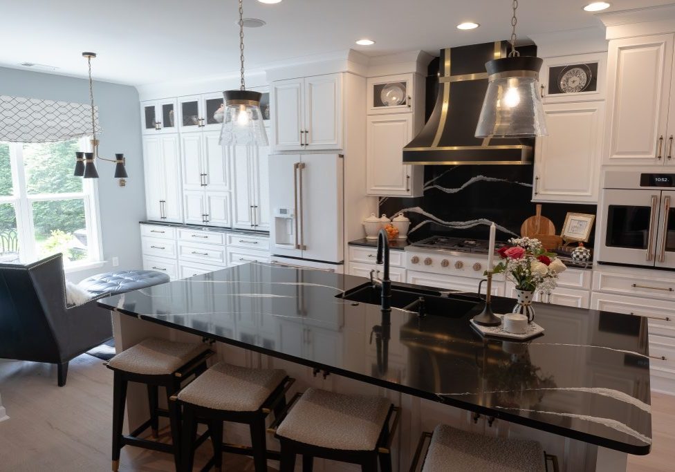 Kitchen Remodel in Mt Juliet with white cabinets and black countertops